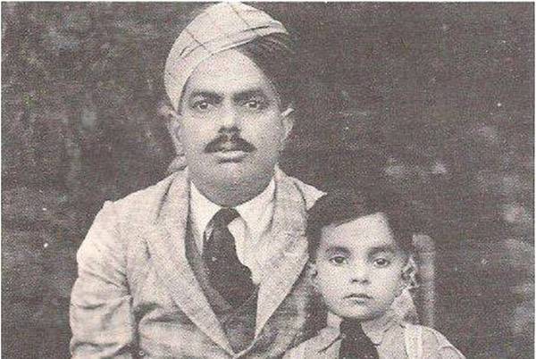Young Ziaul Haq with his father (1929)