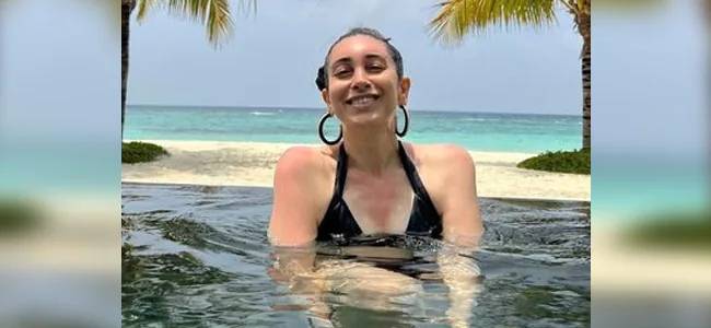 Yesteryear Bollywood Actor Karisma Kapoor Sizzles In Pool Post