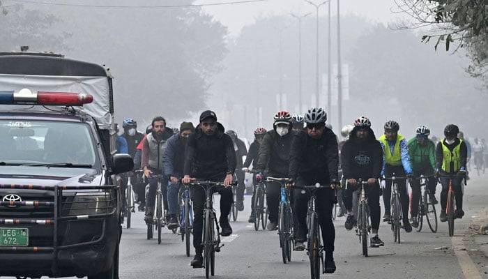 Cycling Enthusiasts Take To Lahore's Smog-Filled Streets