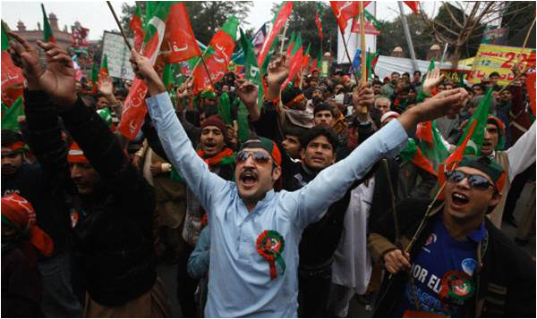PTI supporters protest against price hike, during a rally in Lahore on December 22