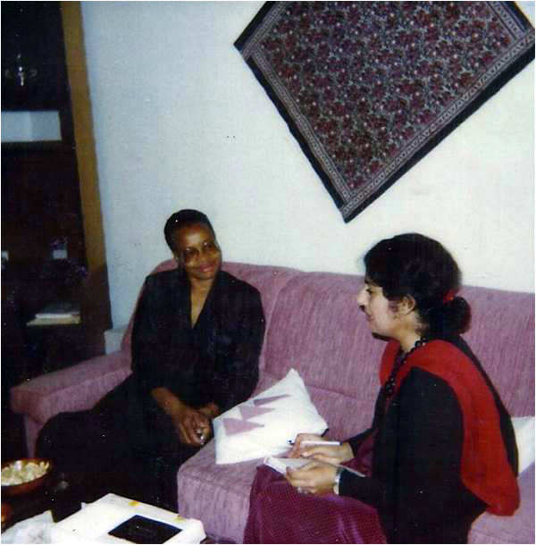 Graca Machel pays the Abbas family a visit. Here she is seen sitting with Mr. Abbas's wife Nigar