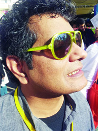 Mohammad Hanif in his neon-yellow glasses