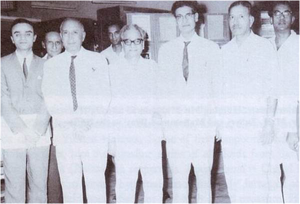 Senior Pakistani scientists. From center to far right: Dr. Salimuzzaman Siddiqui, Dr. Nazir Ahmed, Dr. Raziuddin Siddiqui and Dr. Ishrat Hussain Usmani. Image is public domain Courtesy: Pakistaniat.com
