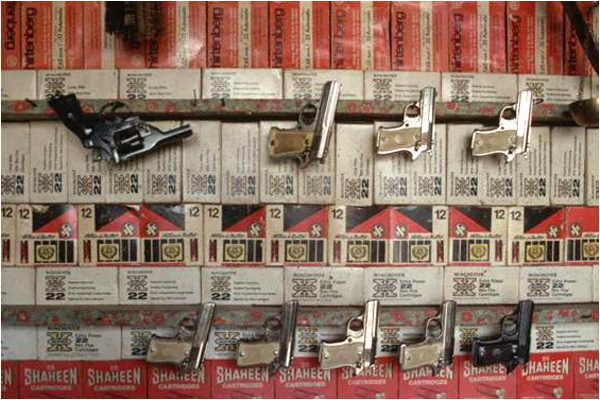Spanish .22 Star pistols made at Darra Adam Khel on sale in a gun shop at Landi Kotal, in an archive photograph from 1980