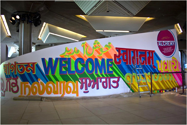 Hand painted welcome sign in many South Asian languages