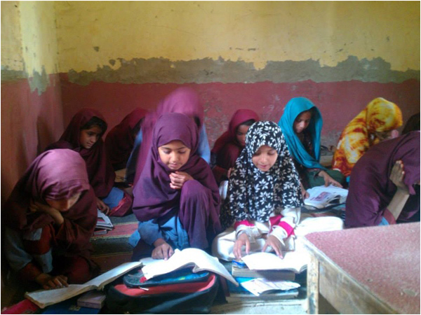 Girls studying at a school built by locals with their own hands under the guidance of Rt-Indus