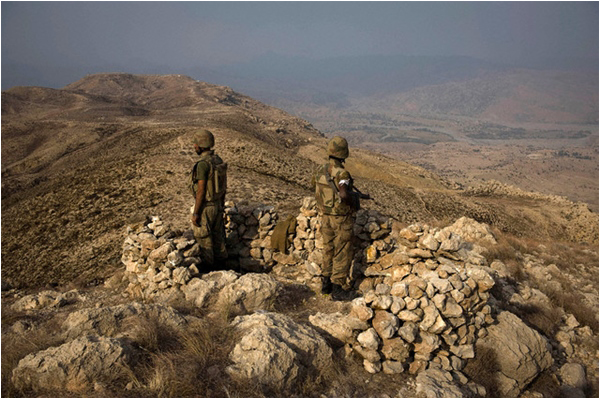 Soldiers secure a mountain top in South Waziristan