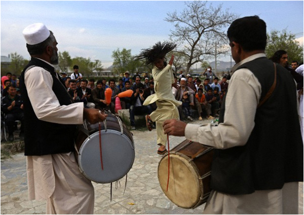 Afghans dance in Kabul to celebrate a peaceful election 