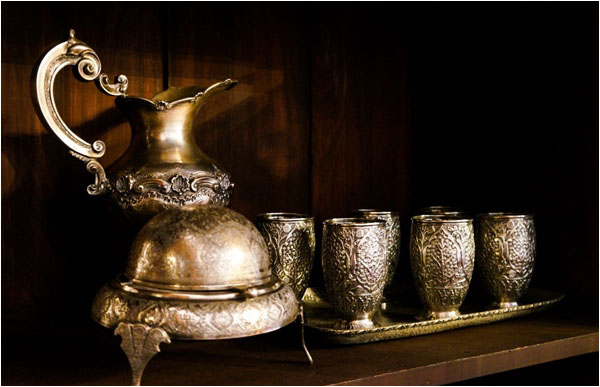 The ancestral silverware on a showcase