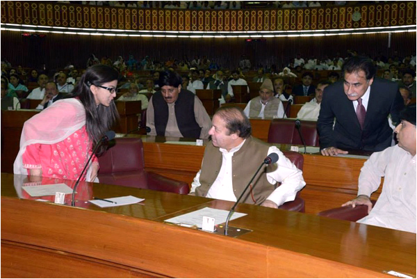 Shaza Fatima Khawaja greeting the Prime Minister in the National Assembly