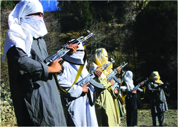 Masked Pakistani Taliban militants take part in a training session in South Waziristan in a photograph released in 2011