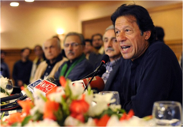 Imran Khan addresses a press conference on November 28