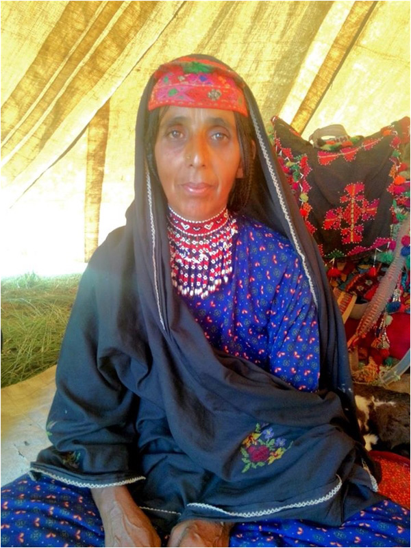 Zahida Bibi with her traditional plaited hair and nomadic attire at Village Batala Kahuta
