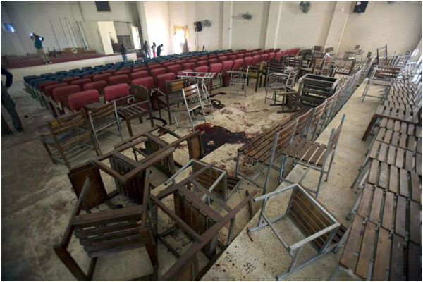 Upturned chairs in the school auditorium