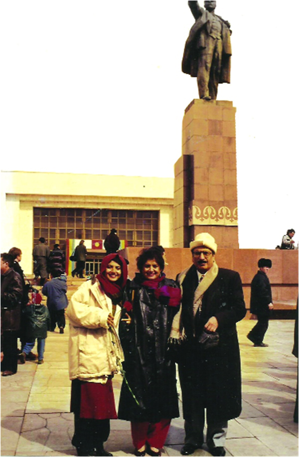 Abbas with his wife and daughter in front of Lenin's statue in Bishkek, Kyrgyzstan