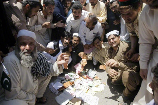 Candidates and residents of Hayatabad UC-43 in Peshawar hold a protest against alleged rigging