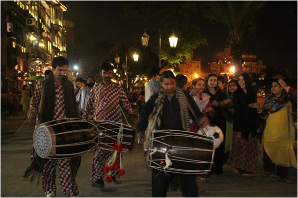 Dhol players from nearby shrines