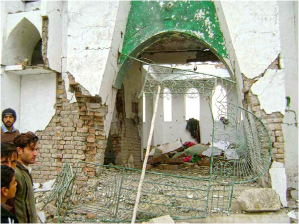 The damaged exterior of the shrine of Sufi saint Ali Mardan Shah