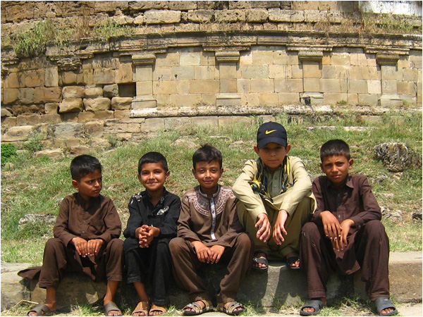 Local children at the Mankiala Stupa - Photo by the author
