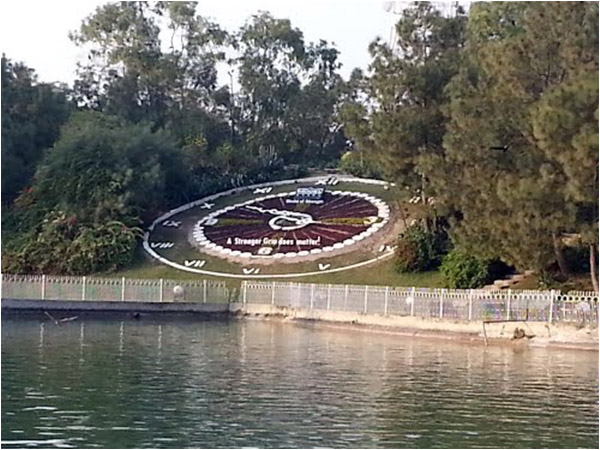 Clock next to the artificial lake