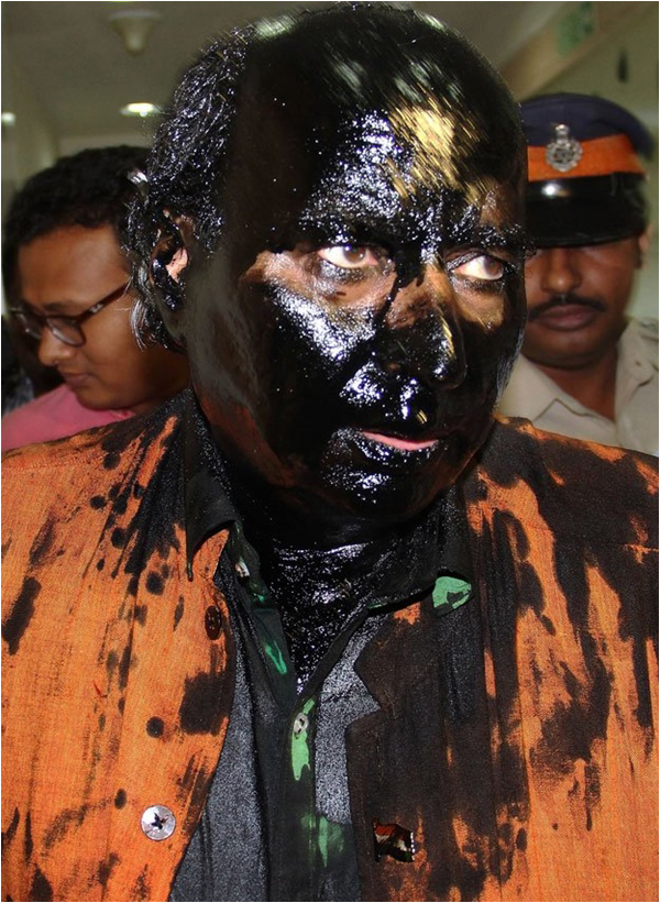 Indian activist Sudheendra Kulkarni after being assaulted as he left his home in Mumbai by activists from Shiv Sena - Courtesy AFP