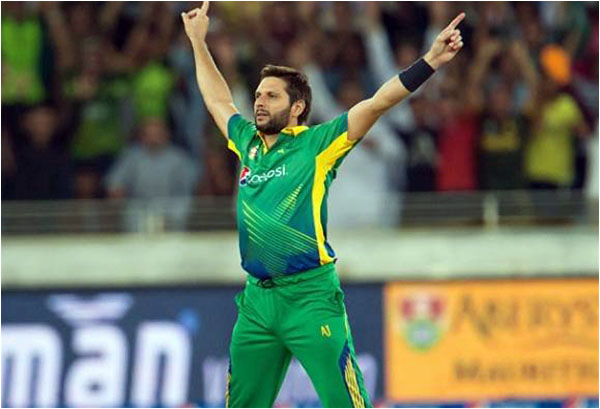 Shahid Afridi celebrates taking a wicket against England