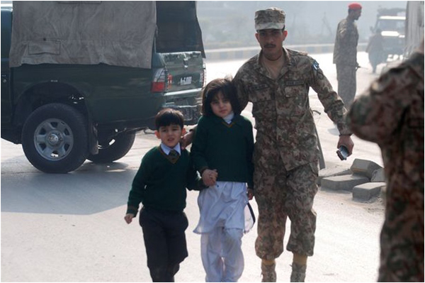 Pakistani school children must brave security threats in addition to the elements