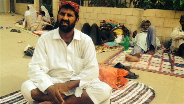Patients awaiting treatment at a Pakistani hospital
