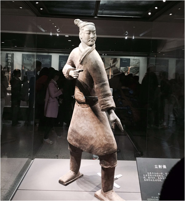 A terracotta warrior in a martial arts stance