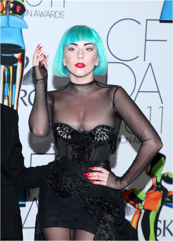 Few can pull off a look involving blue hair and a sheer top like Lady Gaga