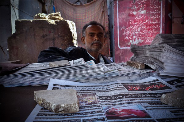 Newspaper seller Muhammad Saleem in Kalri, Lyari in March 2015. Credit: L. Gayer